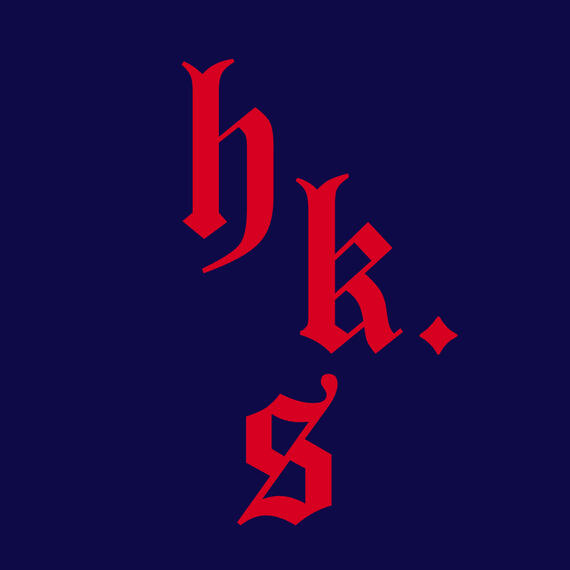 Three letters, "H K S," in a circle.